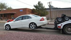 Mercedes-Benz Car Being Repossessed